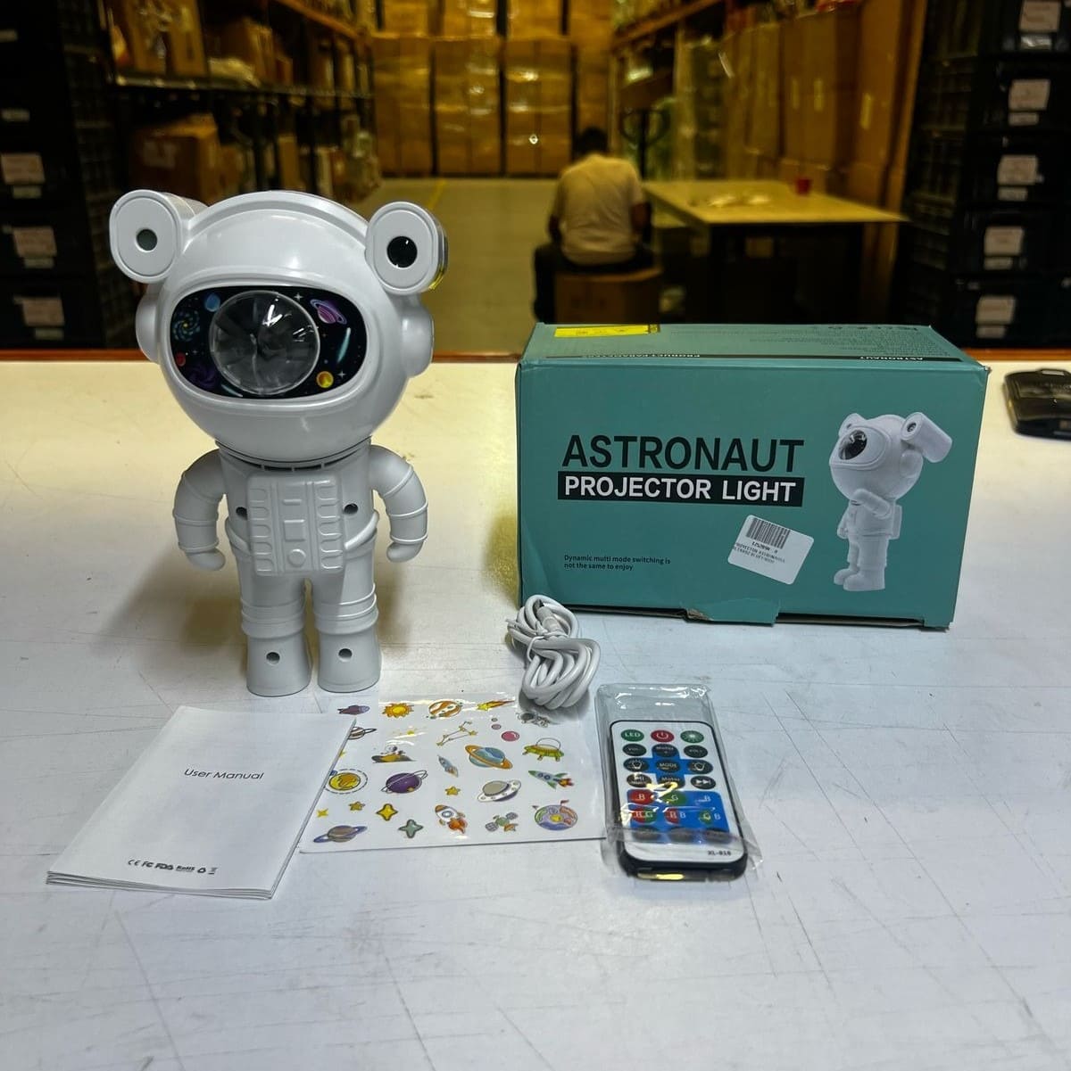 Proyector de Galaxias en Forma de Astronauta Con Altavoz Bluetooth